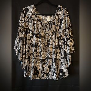 Black and brown print blouse with bell sleeves